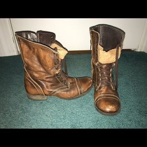 Brown leather Steve Madden combat boots.